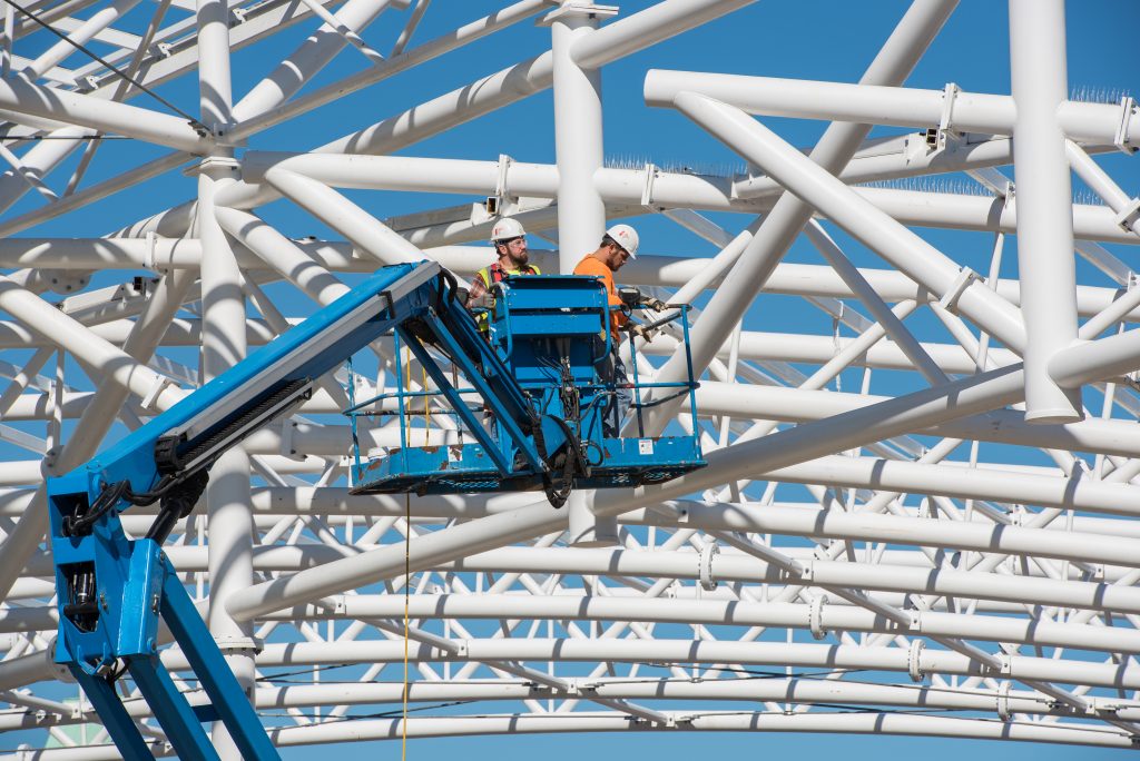 Two workers working on Takoma Langley Crossroads Transit Center