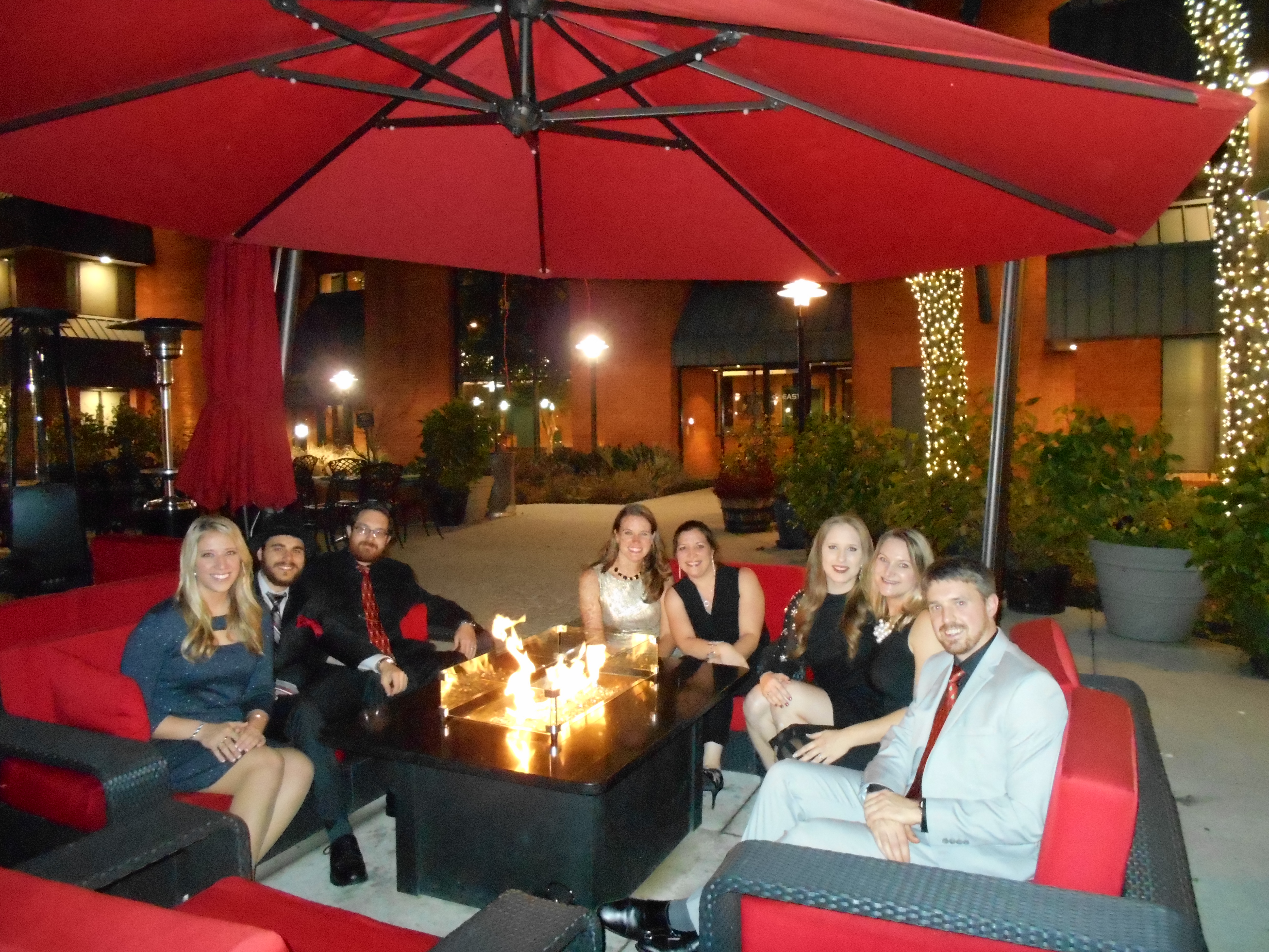 WTB employees sitting around the firepit at the WTB Christams Party 2015